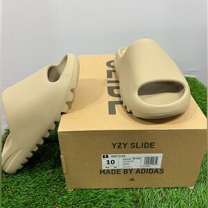 Adidas Yeezy slides, size 10 US, color pure. New with box!